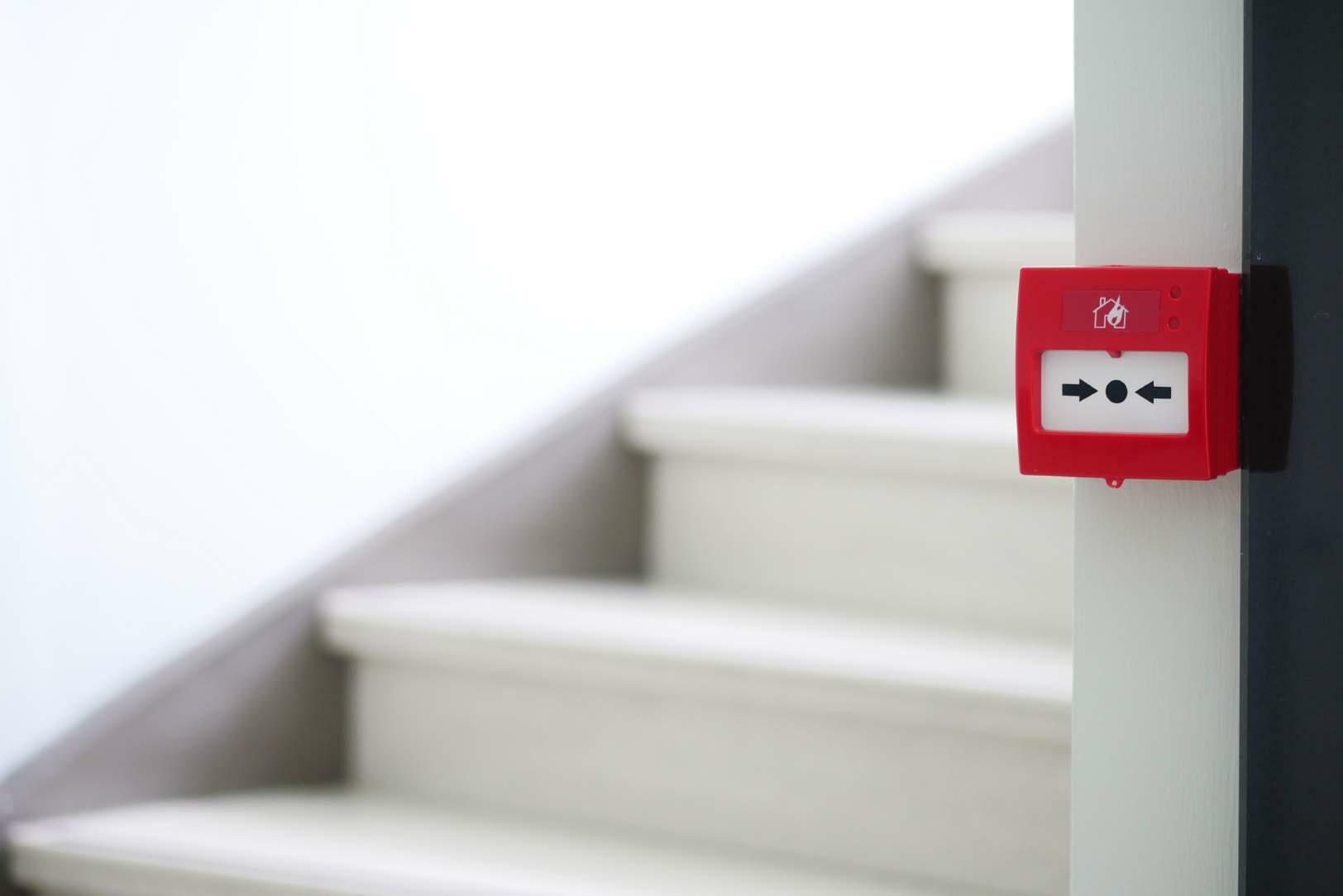 modern security system installation with technicians working on access control and surveillance equipment, professional setting